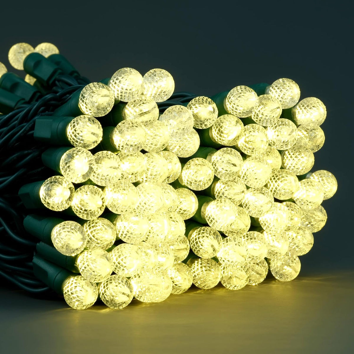 YULETIME 140 Warm White G12 Christmas Lights, 2-Set 24 ft 70 One-Piece LED